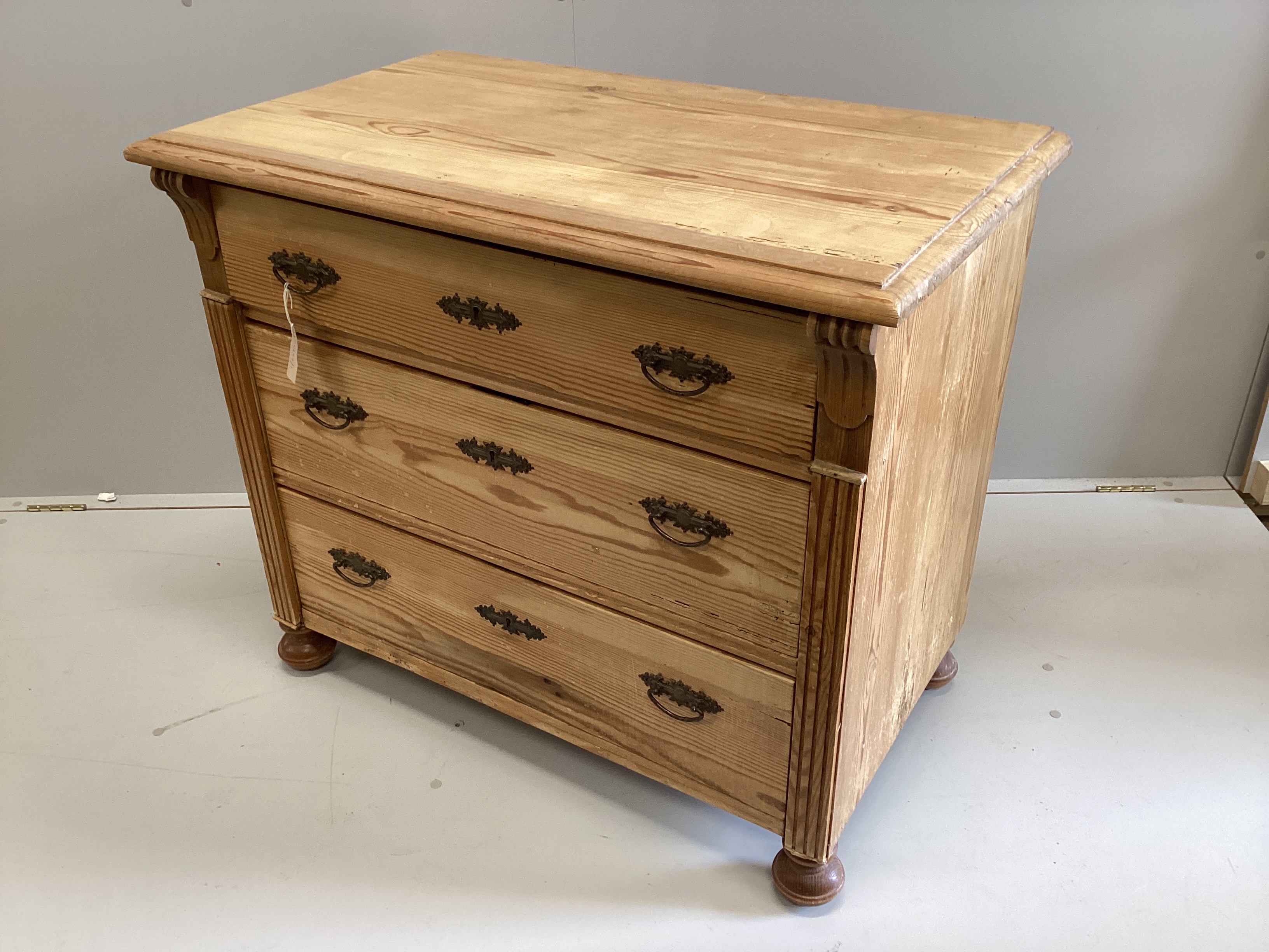 A small 19th century East European pine three drawer chest, width 96cm, depth 56cm, height 82cm